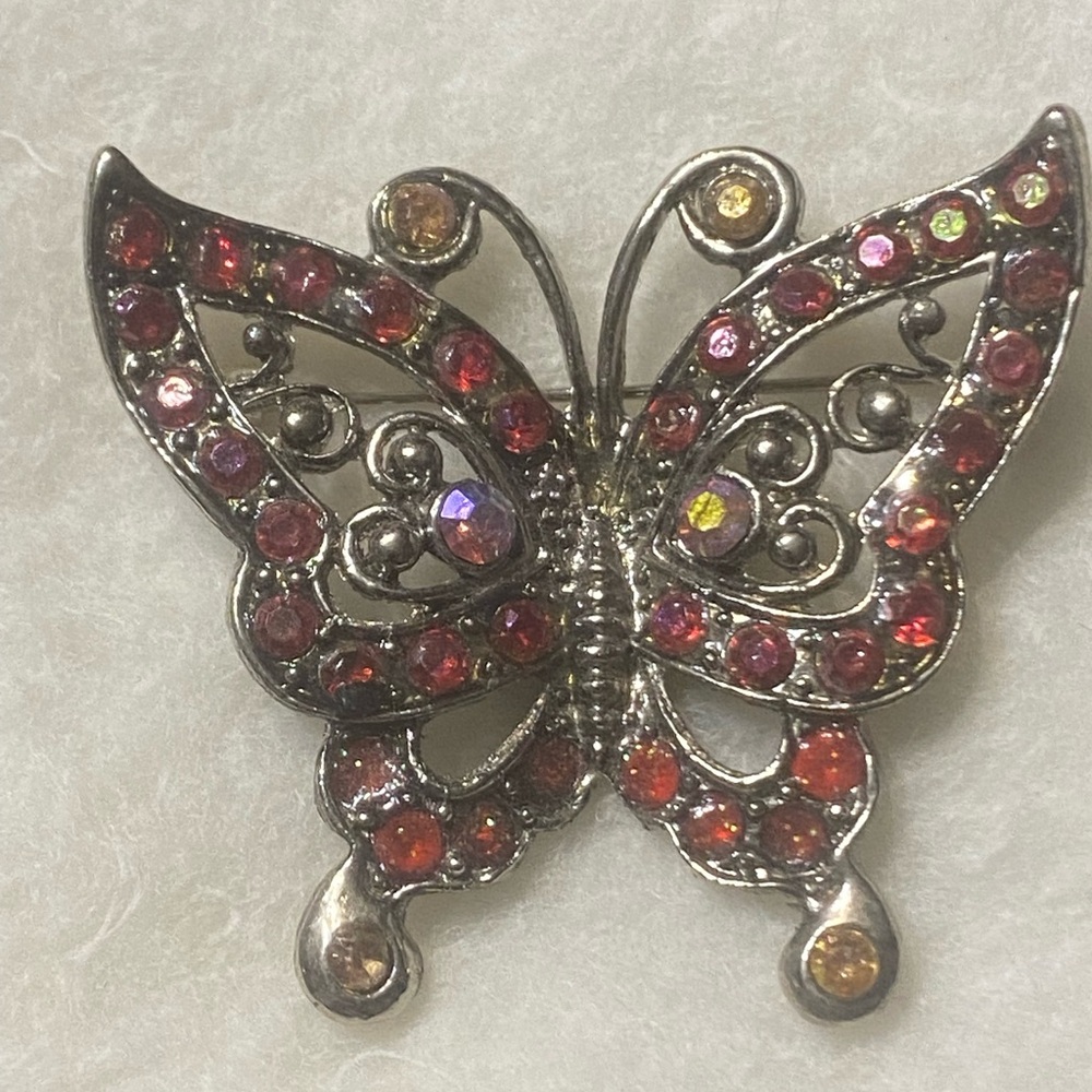 Butterfly Brooch with Red and Pink Rhinestone Accents.  No markings. Vintage